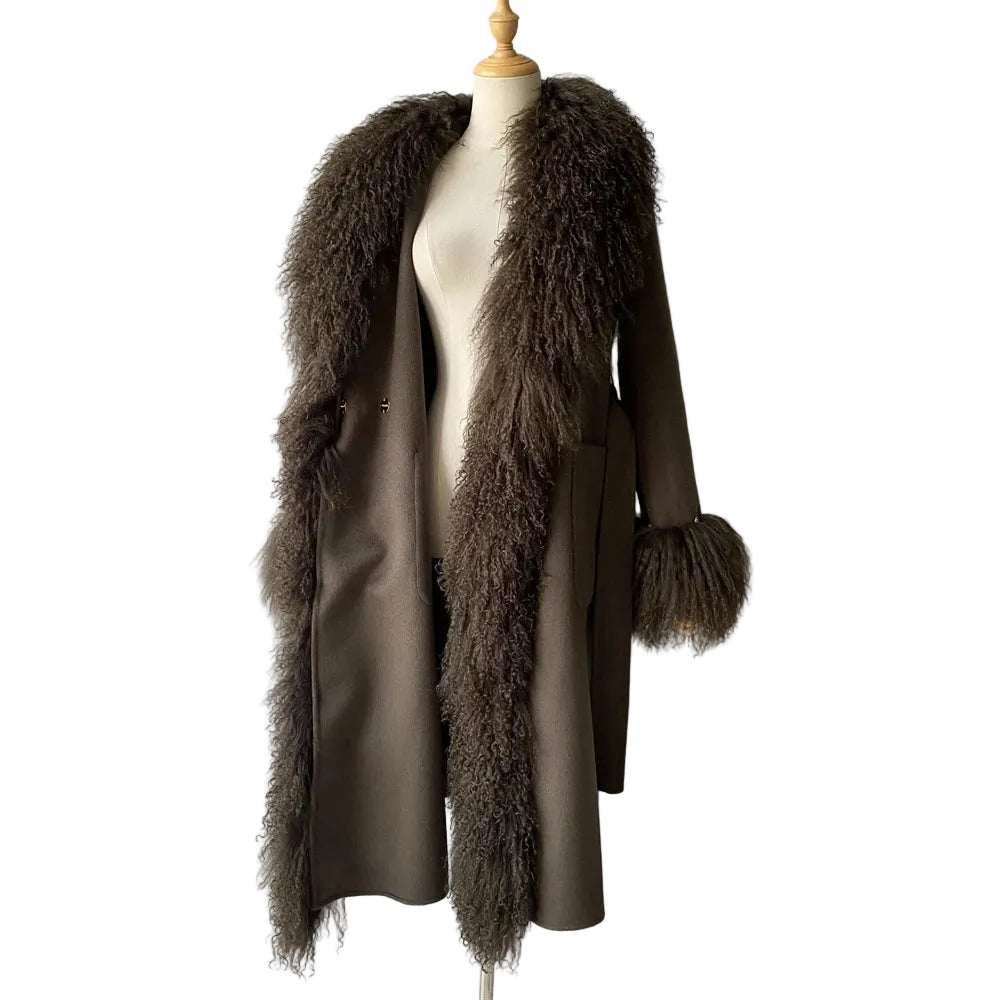 Brown coat with fur trim on a mannequin against a plain background