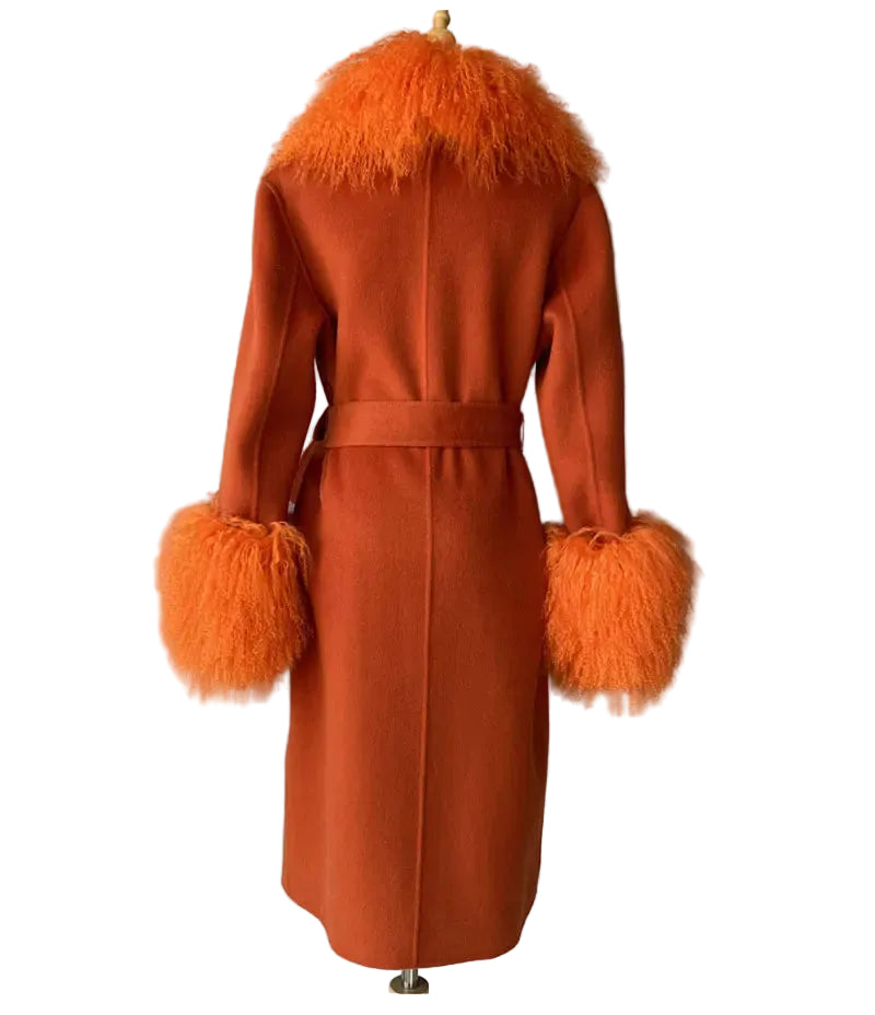 Orange coat with feathered trim on a gray background