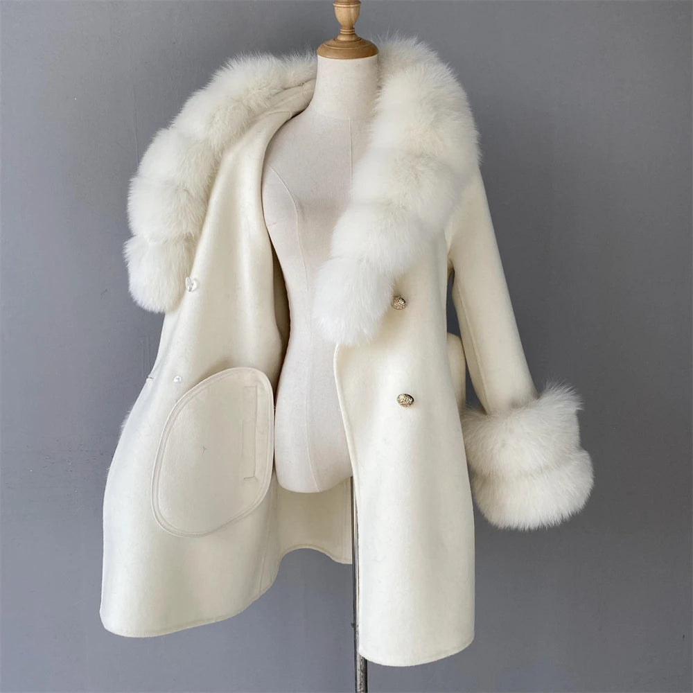 White coat with fur collar and cuffs on a mannequin against a gray background