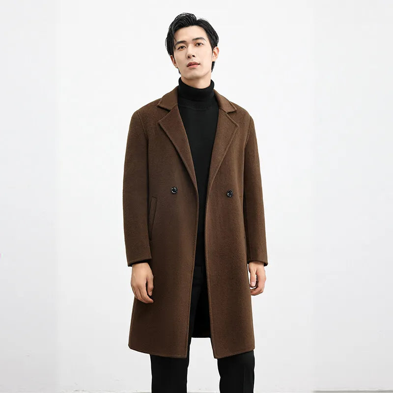 Man wearing a brown coat on a white background