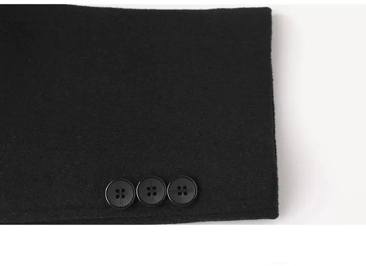 Black sleeve with three buttons on a white background