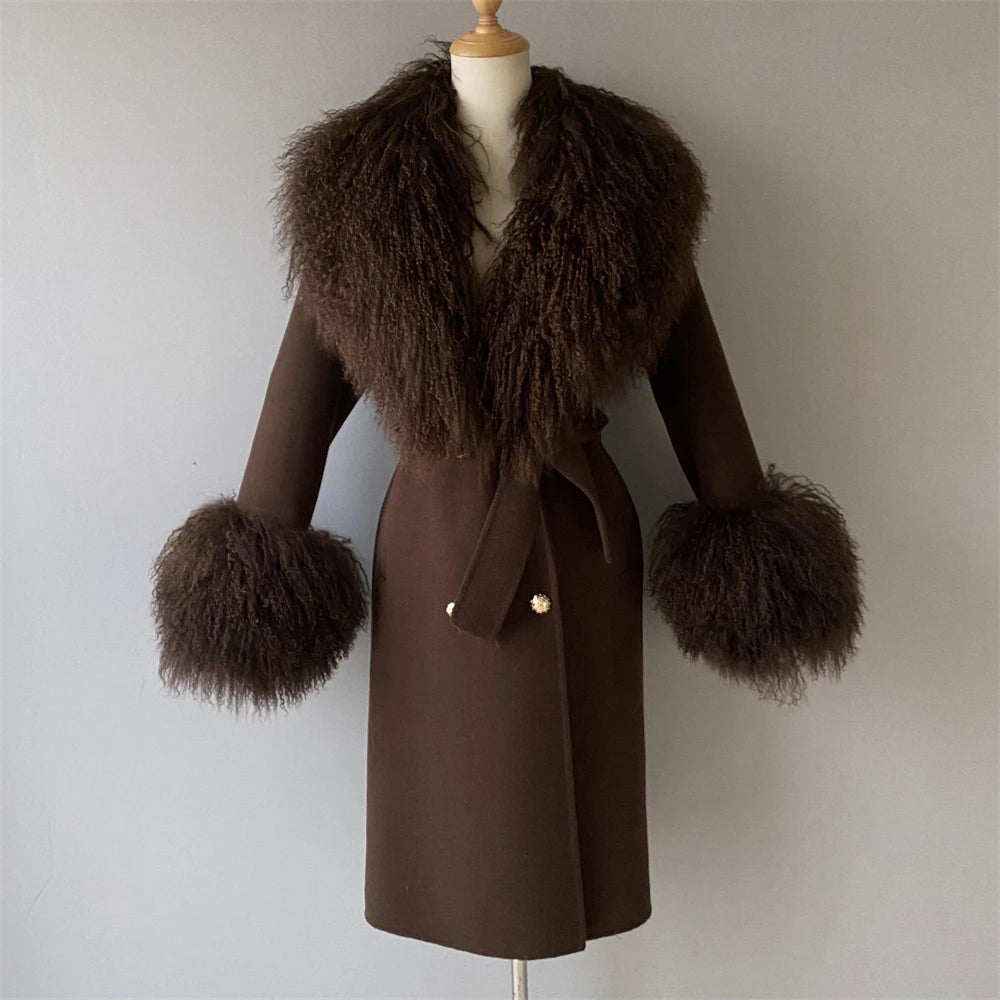 Brown coat with fur trim on a mannequin against a plain background
