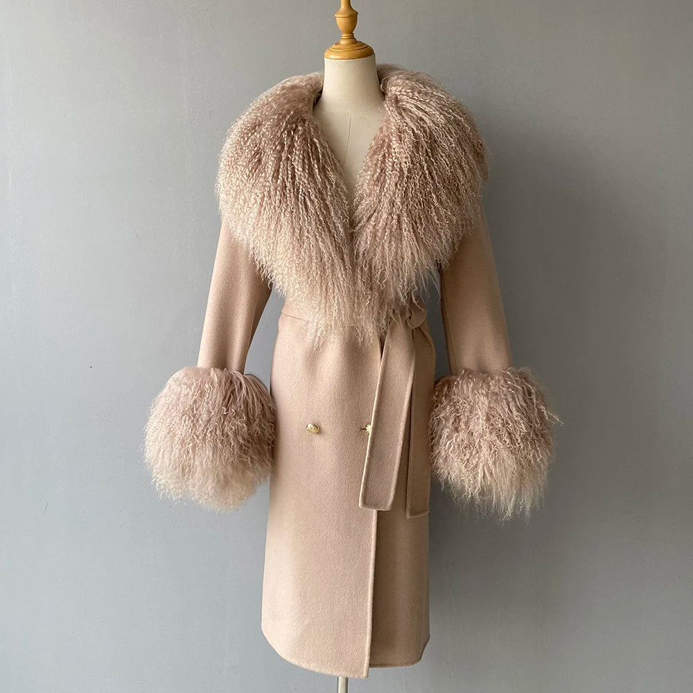 Beige coat with fur accents on a mannequin against a gray background