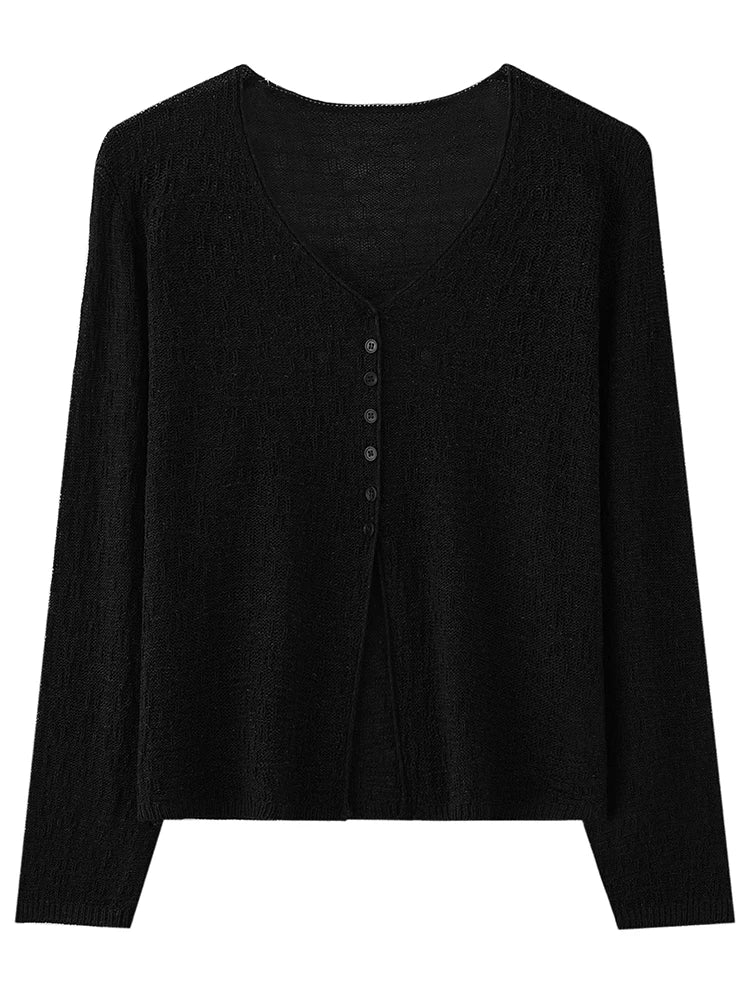 Black long-sleeve shirt with button details on a white background