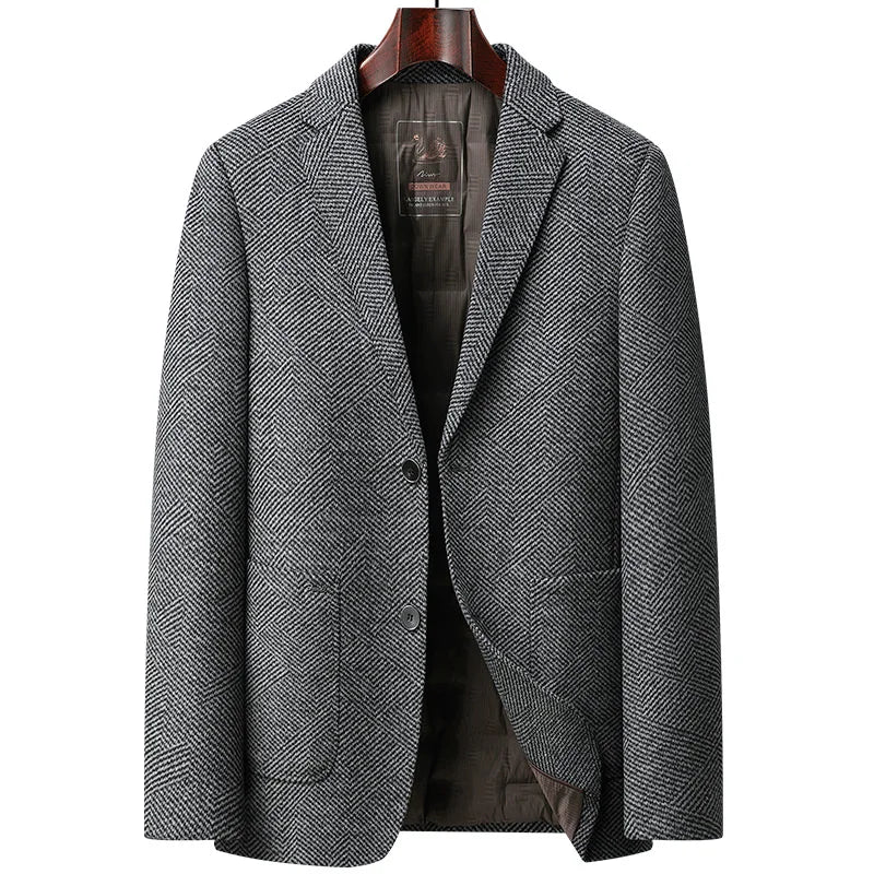 Gray herringbone blazer on a white background
