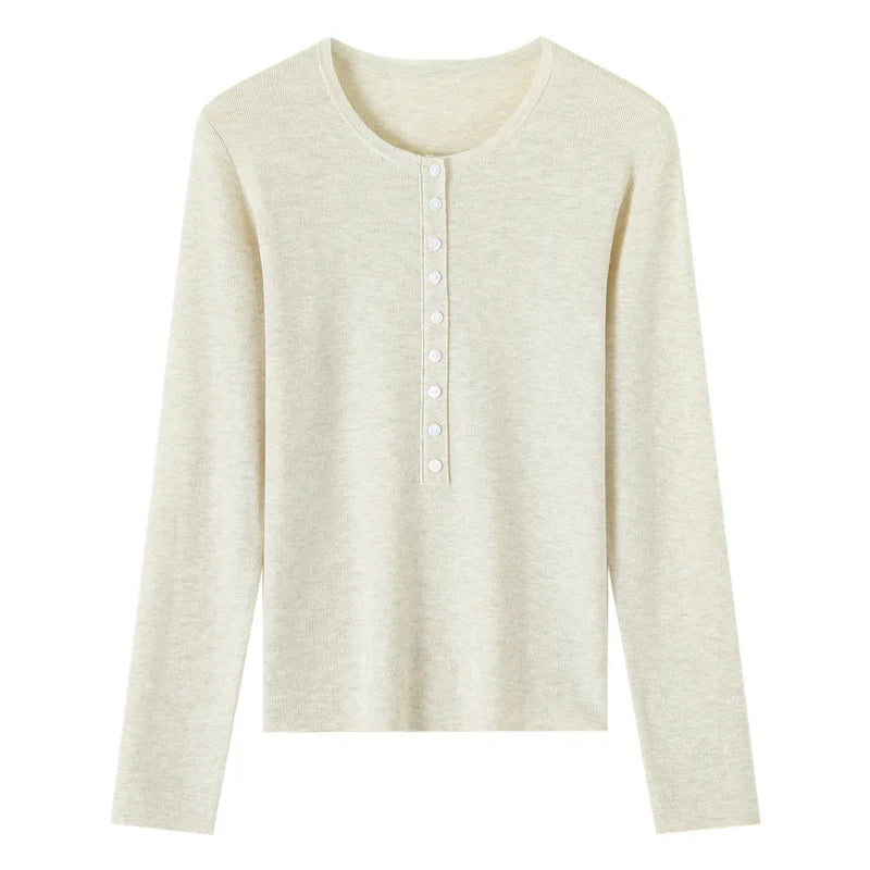 Cream-colored long-sleeve shirt on a white background