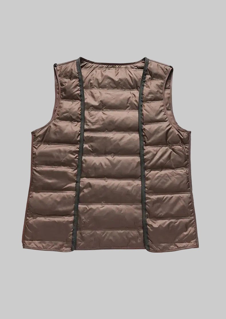 Brown puffer vest on a white background