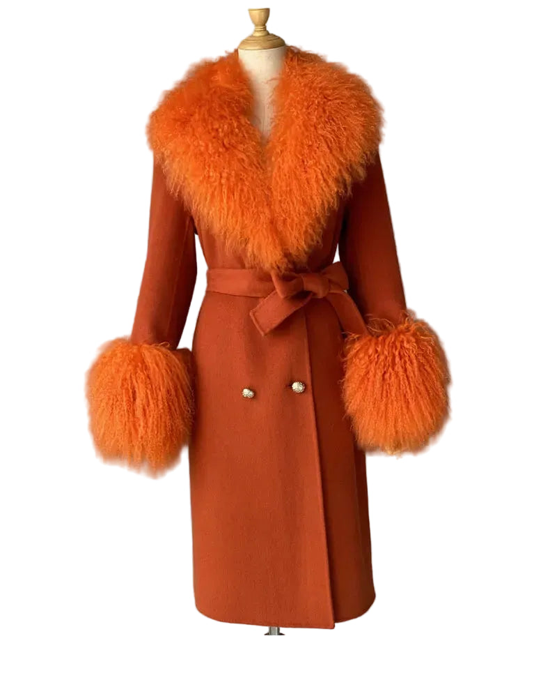 Orange coat with fur trim on a mannequin against a gray background