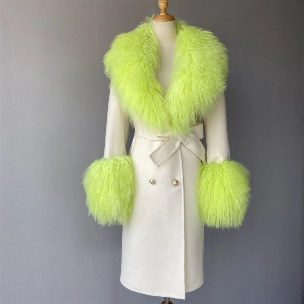 White coat with bright green fur trim on a mannequin against a gray background