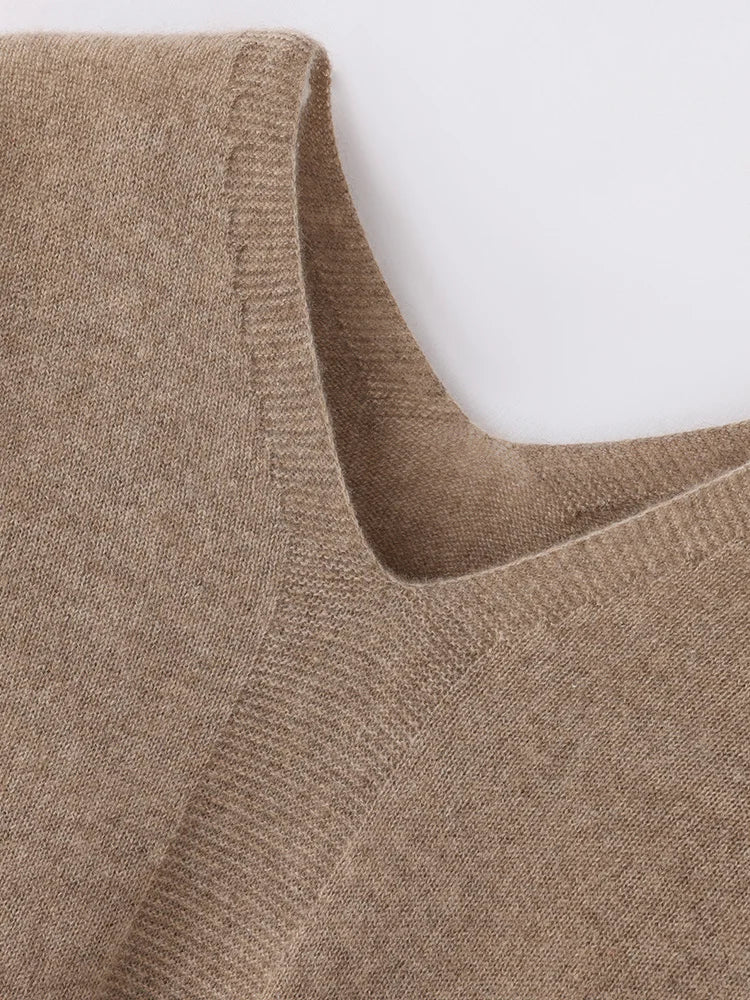 Close-up of a brown sweater with a V-neck on a white background