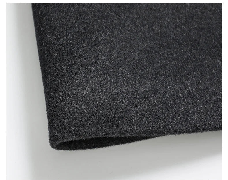 Close-up of dark gray fabric on a white background