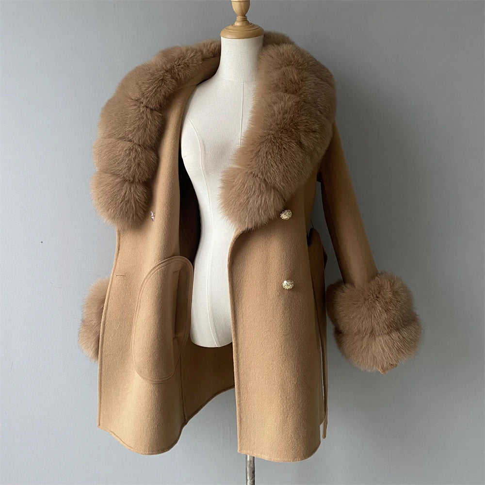 Beige coat with fur trim on a mannequin against a gray background