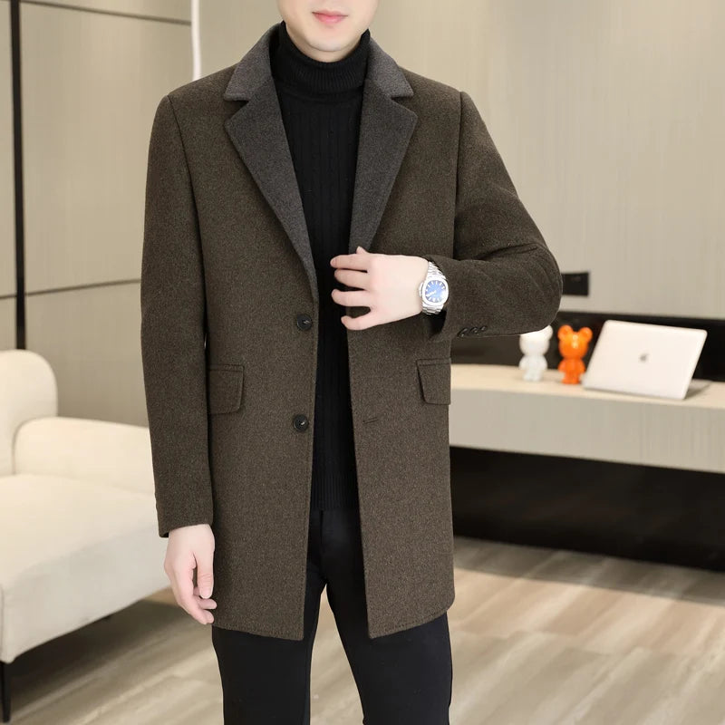 Man wearing a brown coat in an indoor setting