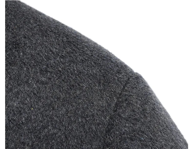 Close-up of a dark gray fabric texture with text overlay