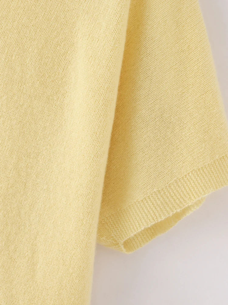 Yellow knitted fabric on a white background