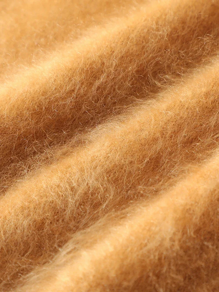 Close-up of beige wool fibers