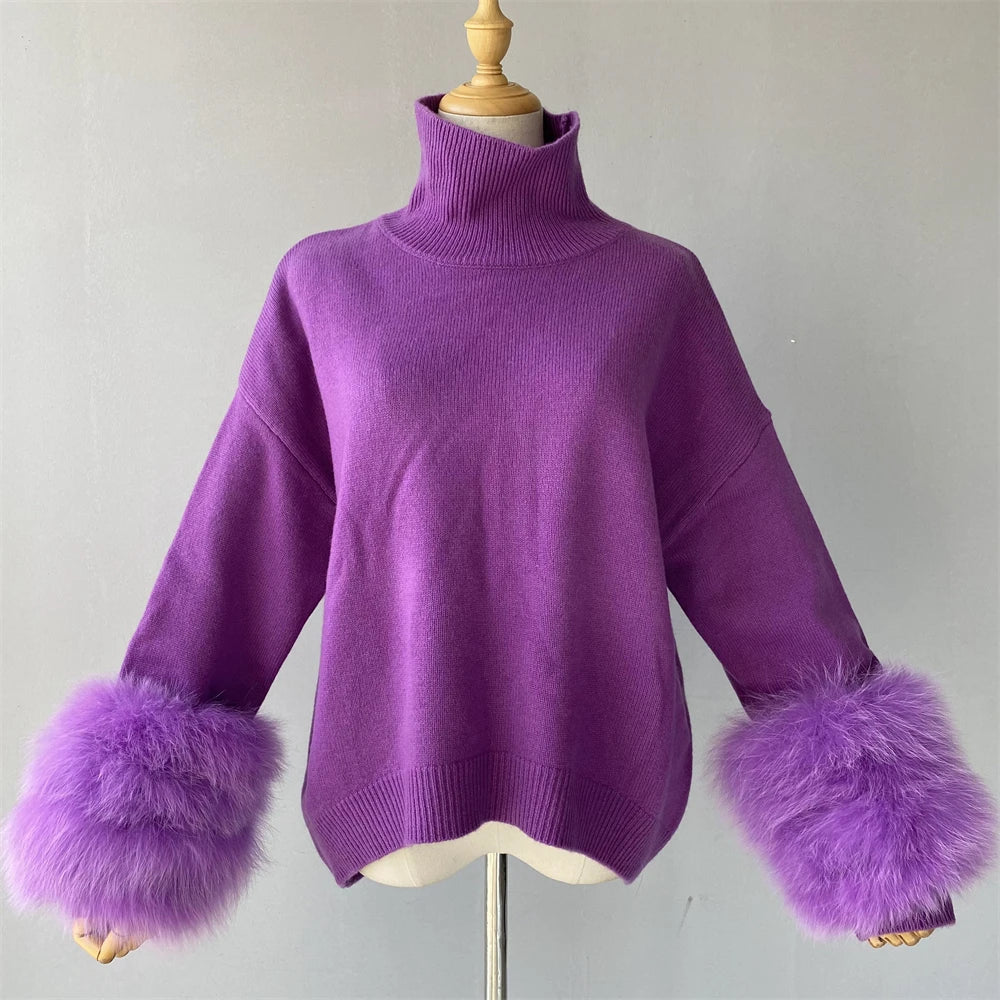 Purple sweater with fluffy cuffs on a mannequin against a plain background