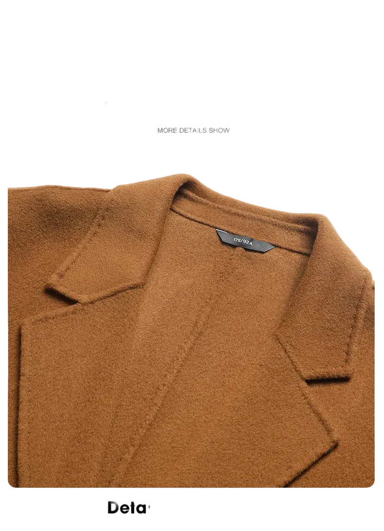 Brown coat with a visible brand label on a white background