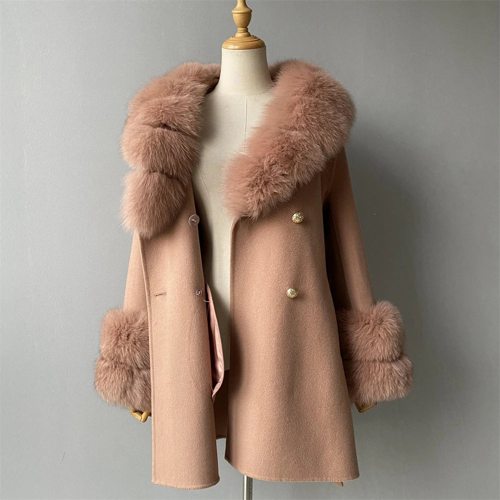 Pink coat with fur trim on a mannequin against a gray background