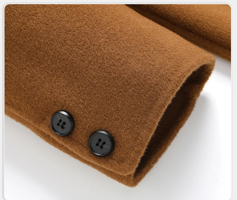 Close-up of brown fabric with two black buttons on a white background