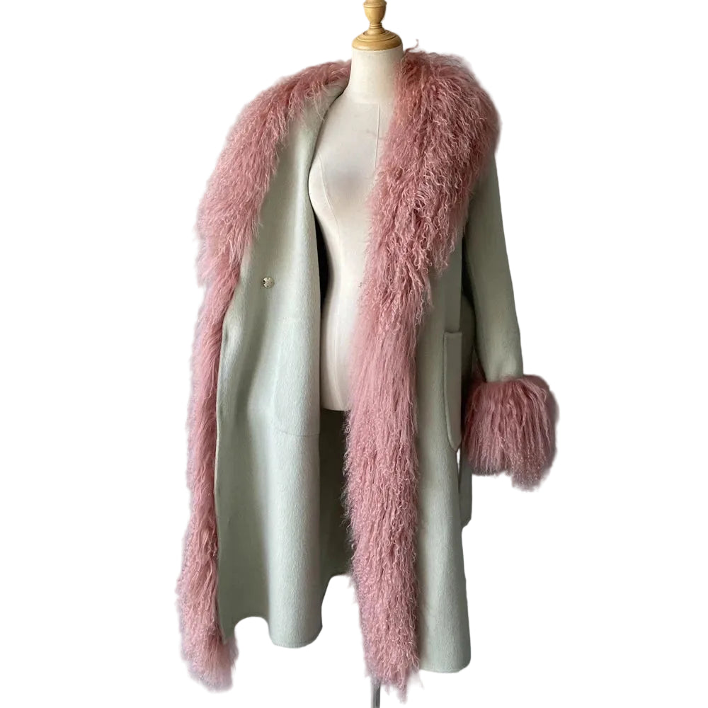Green coat with pink fluffy trim on a mannequin against a gray background