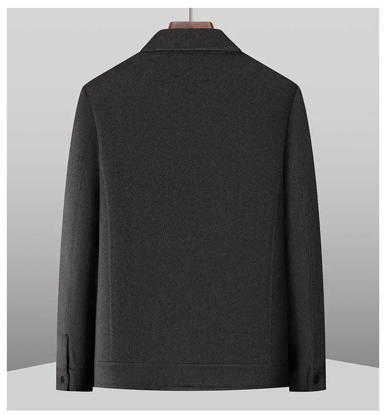 Dark gray jacket on a mannequin against a light gray background