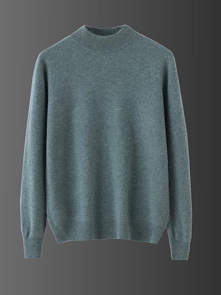 Green sweater on a gray background