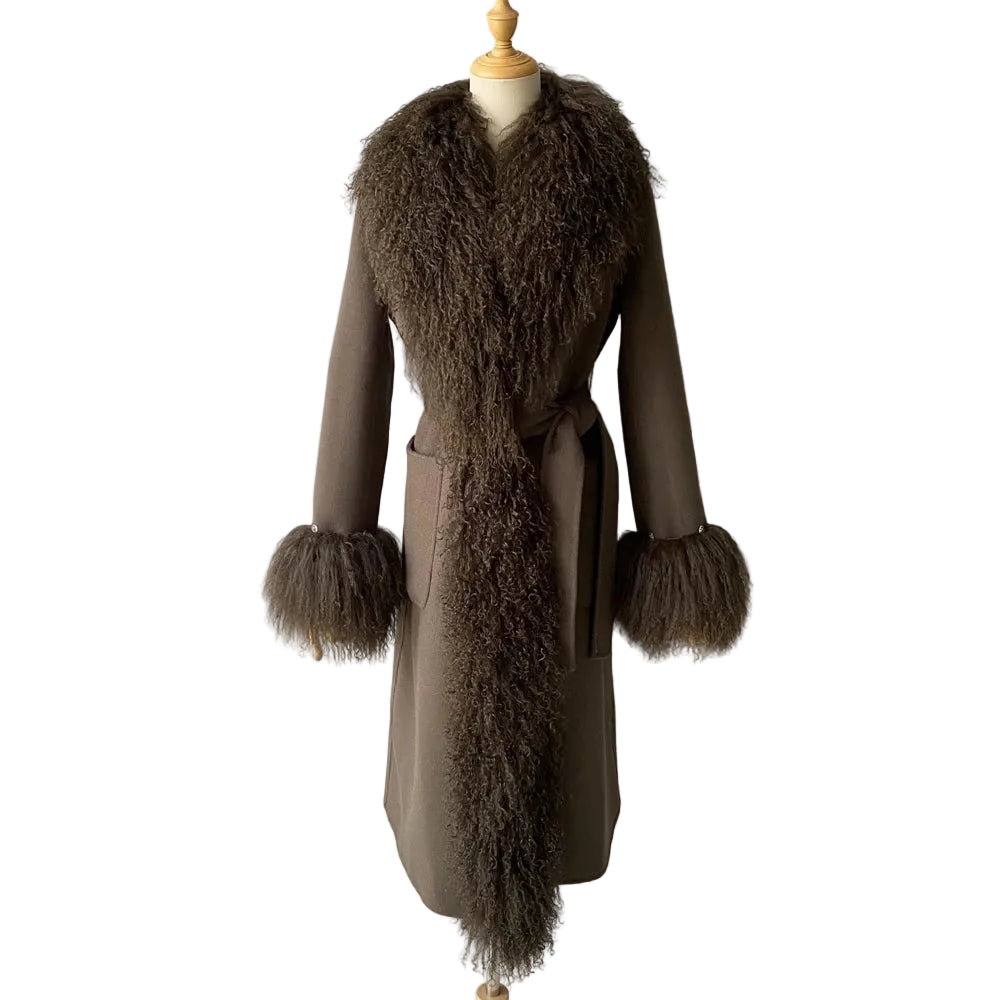 Brown coat with fur trim on a mannequin against a plain background