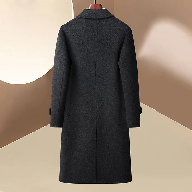 Dark gray coat on a mannequin against a beige background