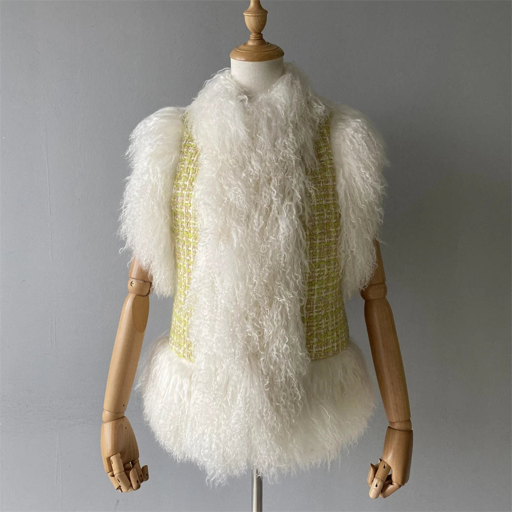 Mannequin wearing a white fluffy vest over a yellow textured top against a gray background