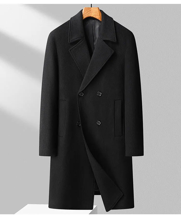 Black coat on a hanger against a gray background