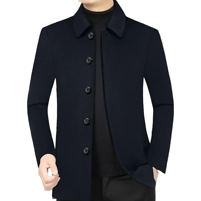 Navy blue coat with button details on a white background