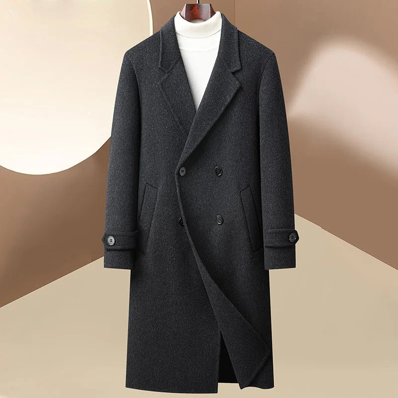 Dark gray overcoat on a mannequin against a beige background