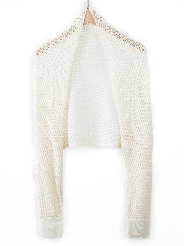 White knit cardigan on a white background