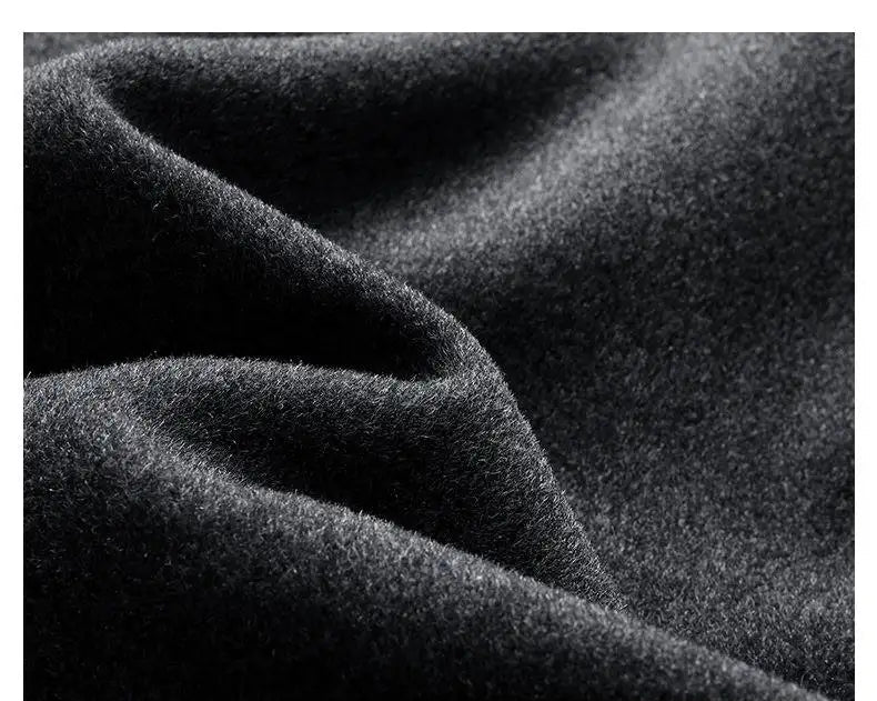 Close-up of dark fabric texture with a black text box at the bottom.