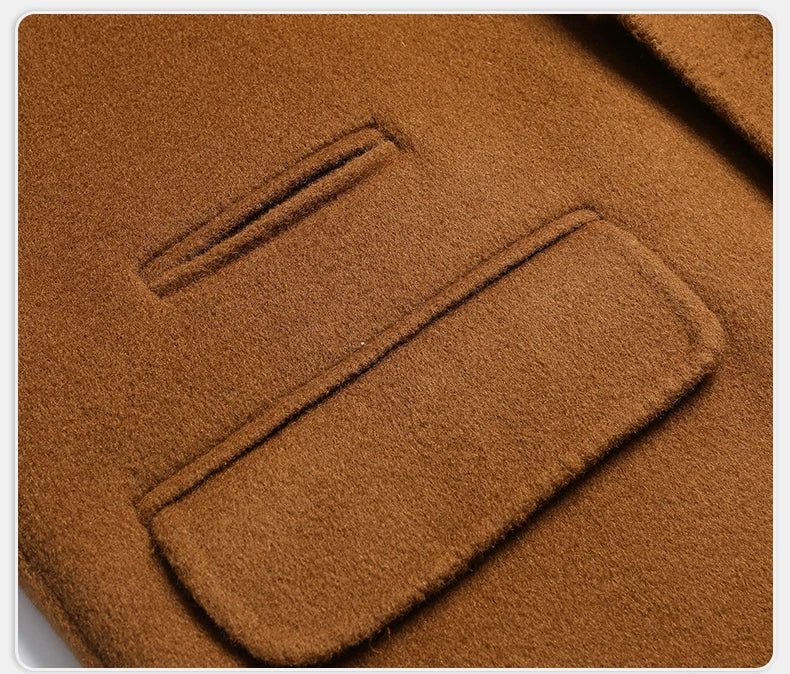 Close-up of a brown fabric with a pocket detail