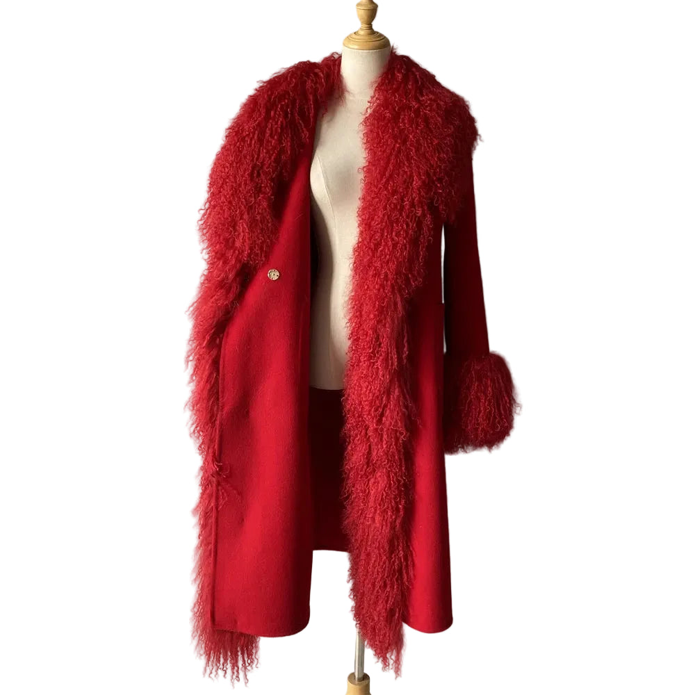 Red fur coat on a mannequin against a plain background