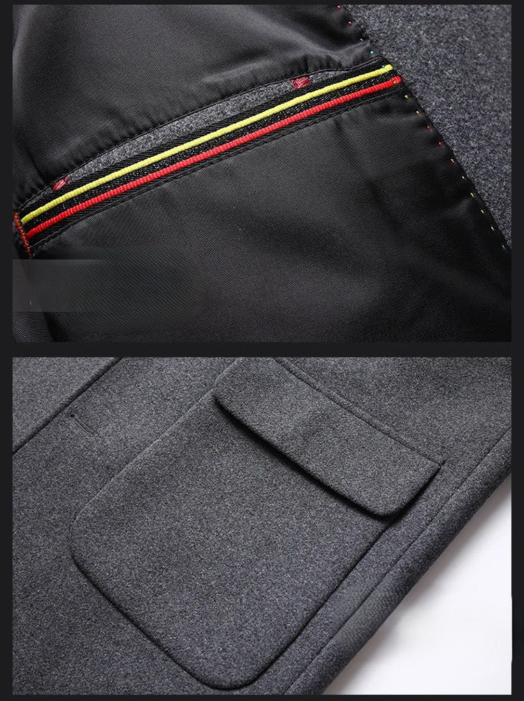 Close-up of a black jacket with zipper details and a pocket on a white background