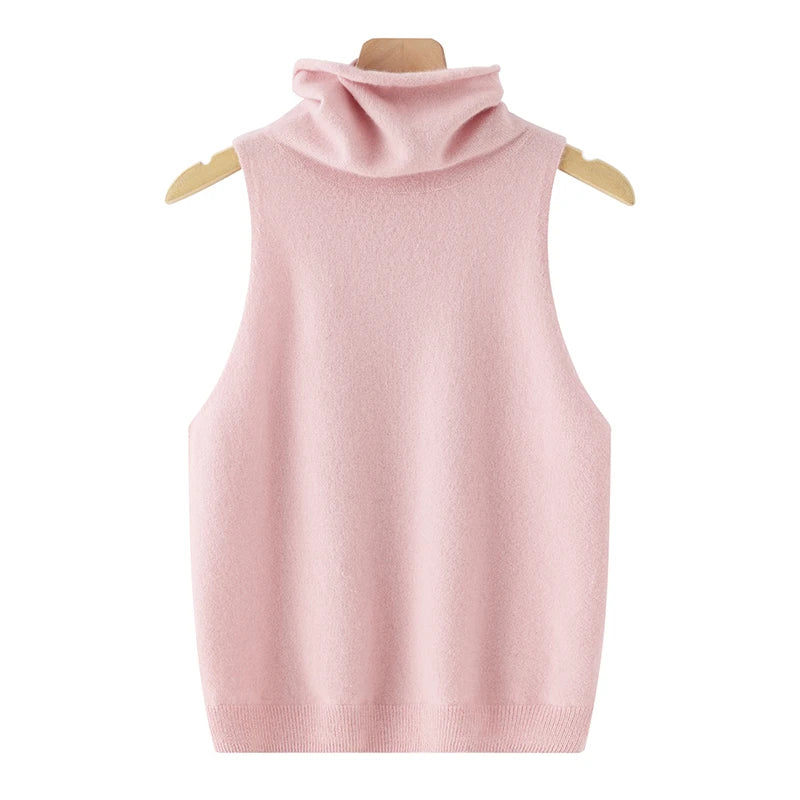 Pink sleeveless sweater vest on a mannequin against a white background