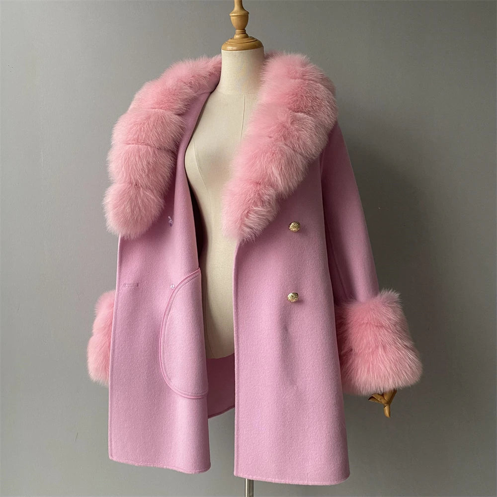 Pink coat with fur trim on a mannequin against a gray background