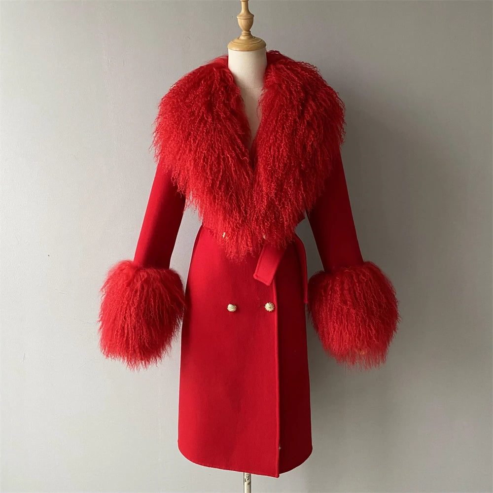Red coat with fur trim on a mannequin against a plain background