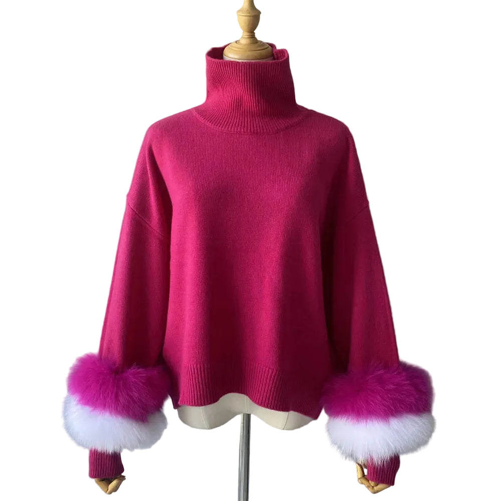 Pink sweater with fur cuffs on a mannequin against a plain background