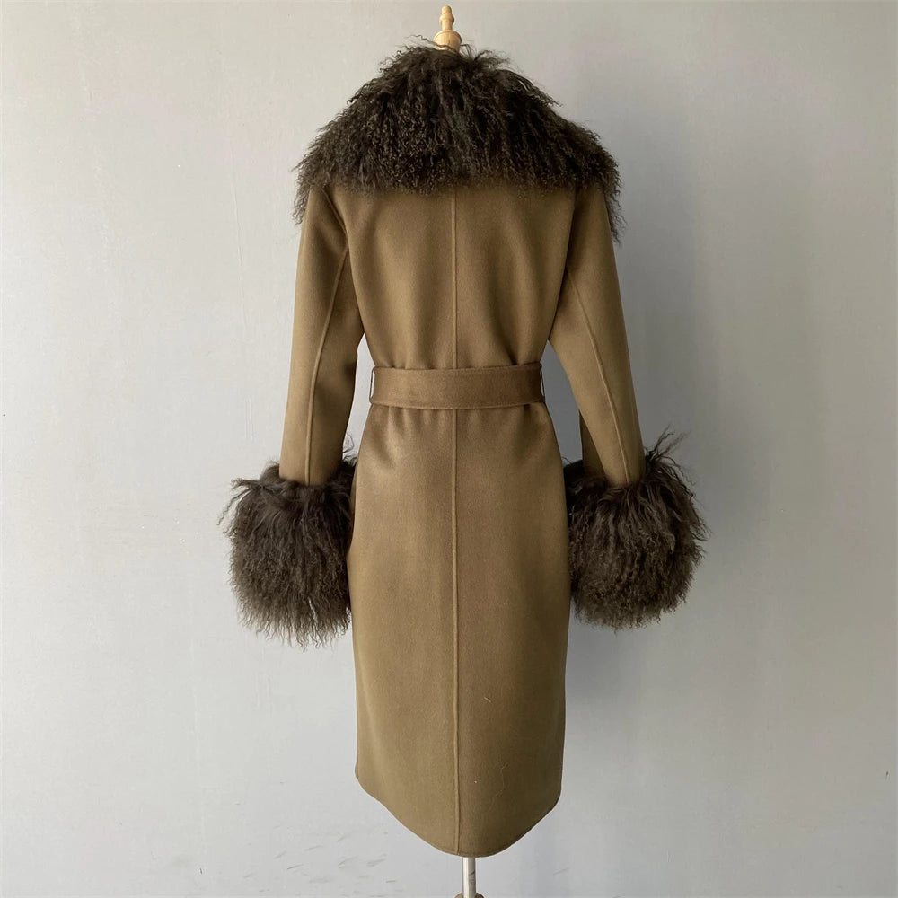Beige coat with fur trim on a mannequin against a plain background