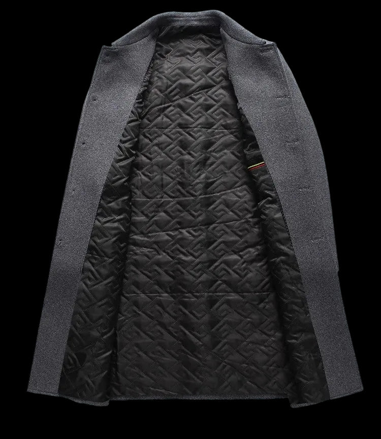 Gray jacket with quilted black lining on a white background