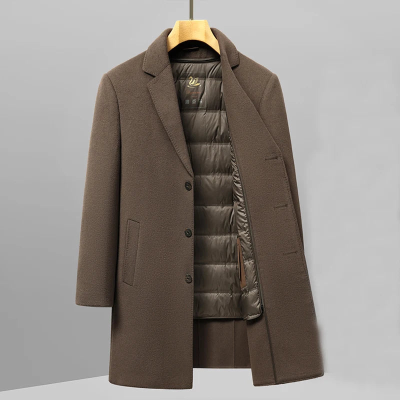 Brown coat with a gray puffer lining on a hanger against a gray background