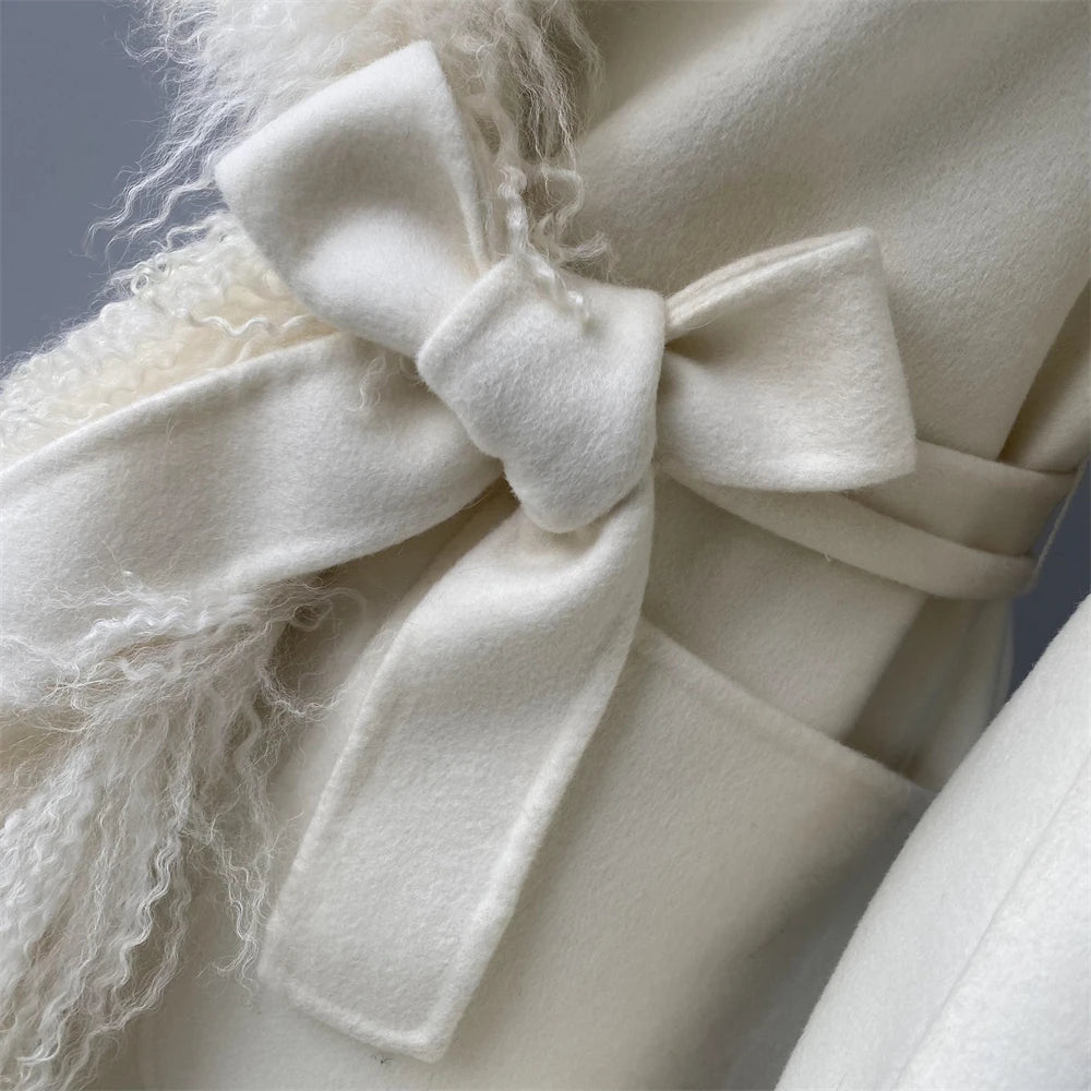 Close-up of a white bow on a textured fabric background