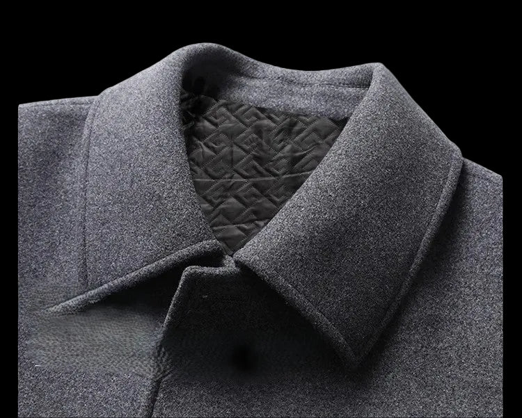 Close-up of a gray coat collar with quilted lining